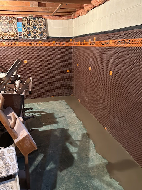 Basement being repaired and waterproofed Basement being repaired and waterproofed